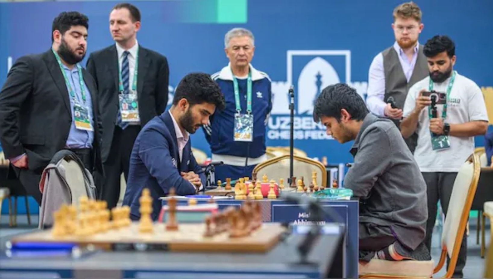 Abhimanyu Mishra, an American chess prodigy with Indian roots, made history when he defeated the reigning world champion, D Gukesh, in a classical chess match at the FIDE Grand Swiss 2025 in Samarkand, Uzbekistan.